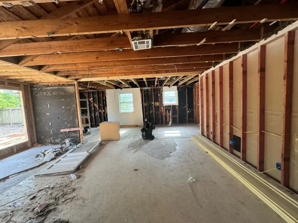House interior opened to the framing during structural repair